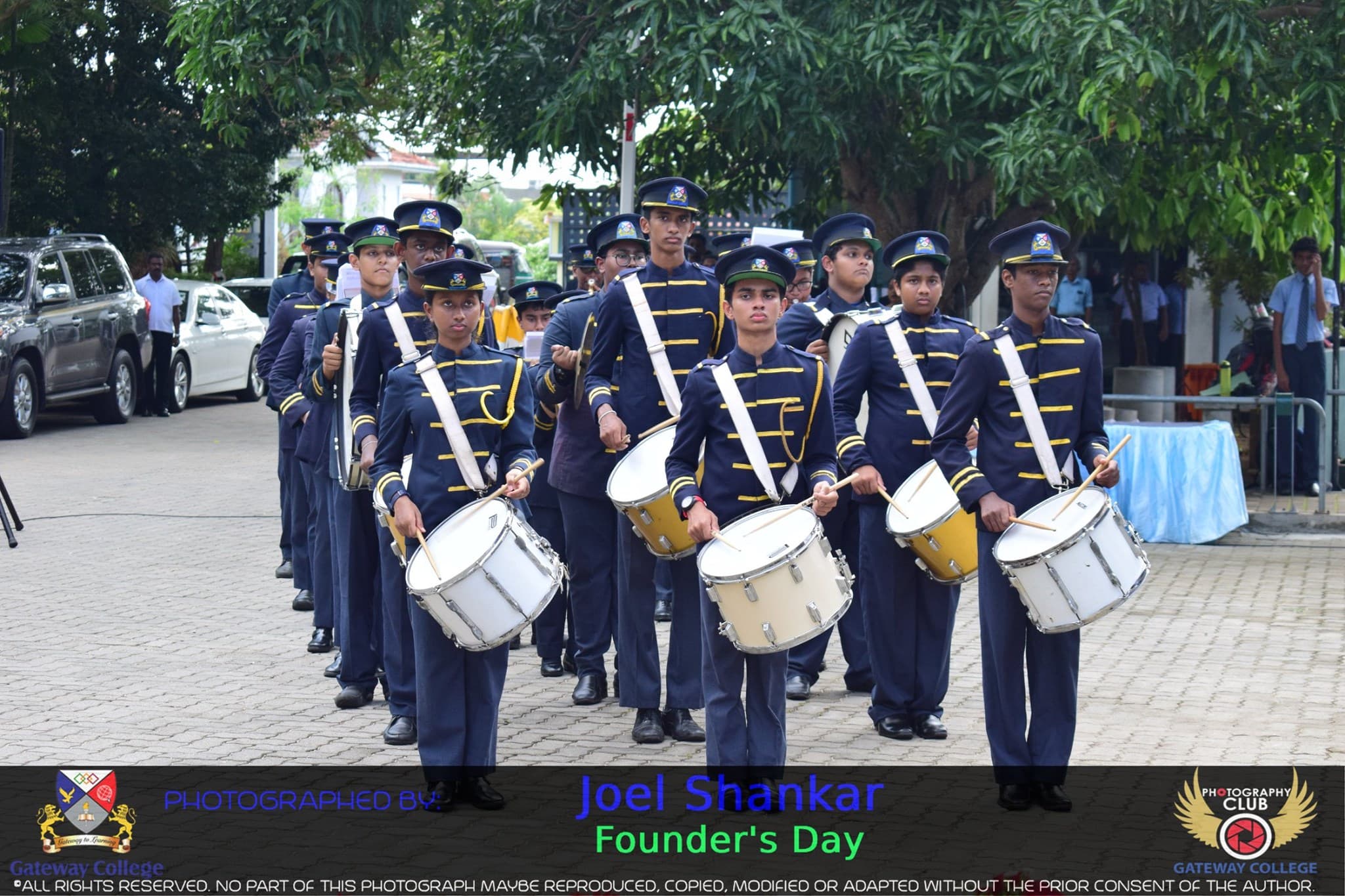 Rian with the school brass band percussion line